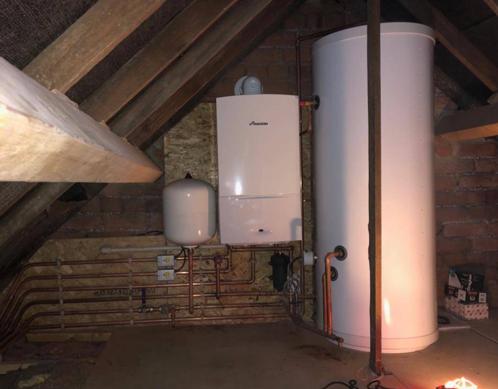 Worcester boiler and hot water cylinder fitted in a loft