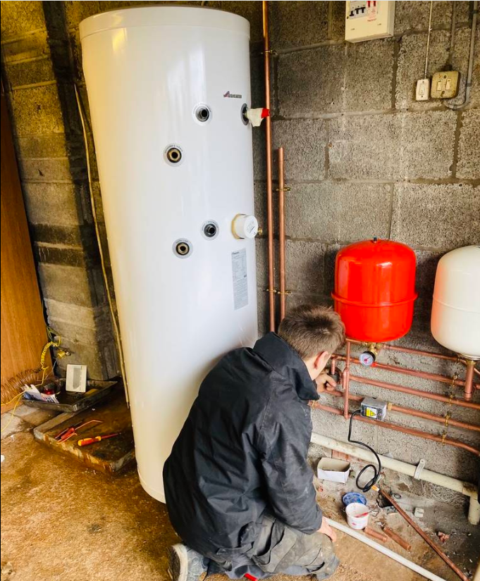 Unvented hot water cylinder installed with expansion vessels